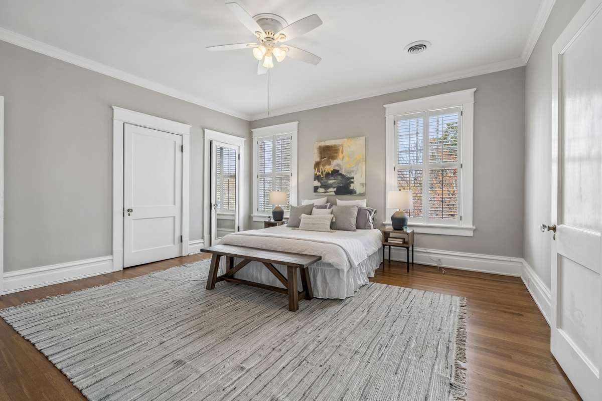 Rear Upstairs Center Bedroom that opens to flex room or nursery or the perfect walk-in closet with dressing area...but this bedroom does have double closets already