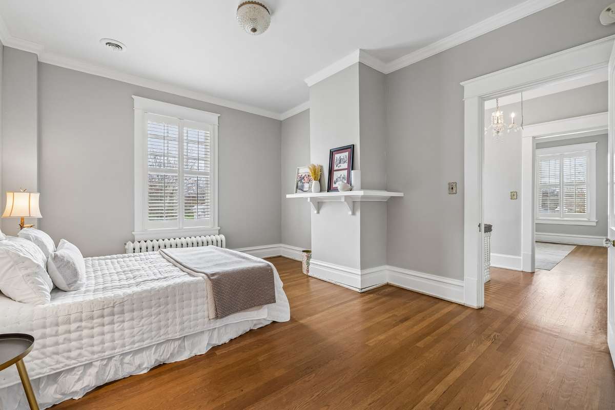 Upstairs Right Side Bedroom as you come up the stairs...it has a back entrance to a flex space and center bathroom