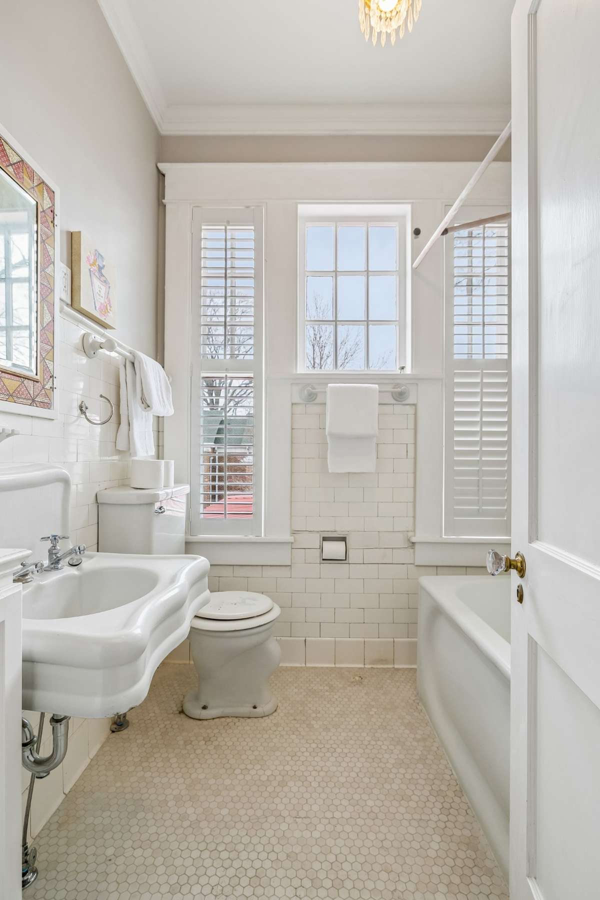 Back Center Hallway bathroom that functions for right and center rear upstairs bedrooms