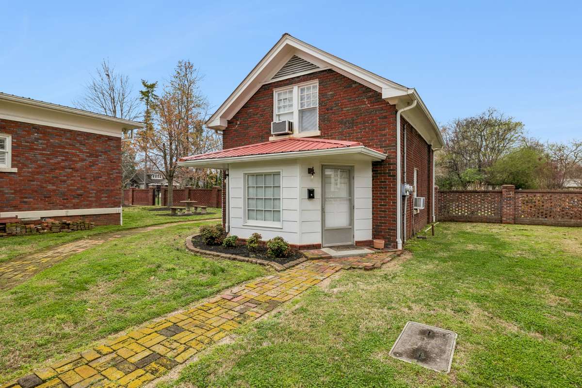 Guest House or Carriage House with two separate apartments, one is an upstairs studio and
one is the downstairs one bedroom apartment that is currently rented
