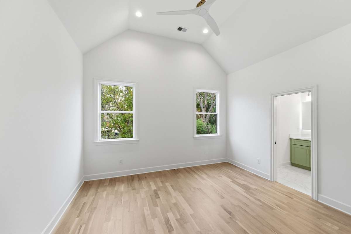 Primary suite at the back of the home for the perfect escape from the day