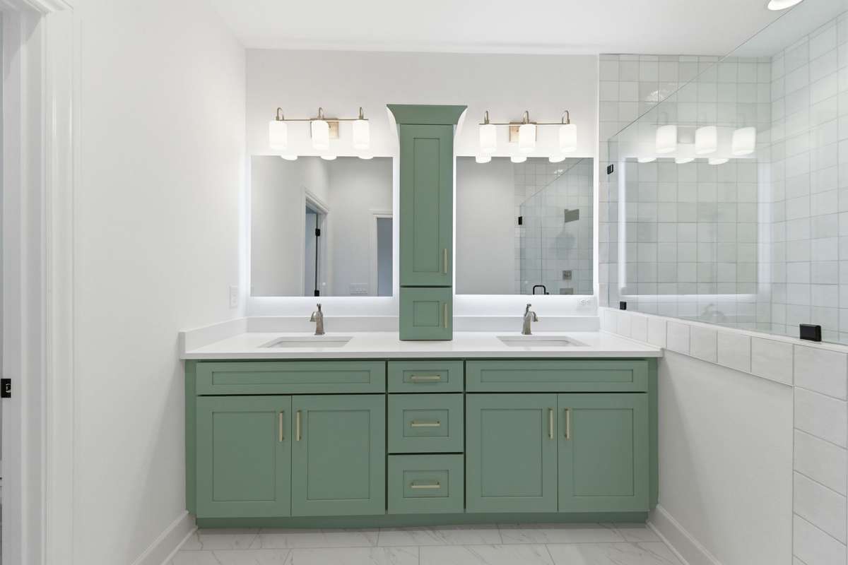 His and Hers sinks and extra cabinet space on the counter top for more organization