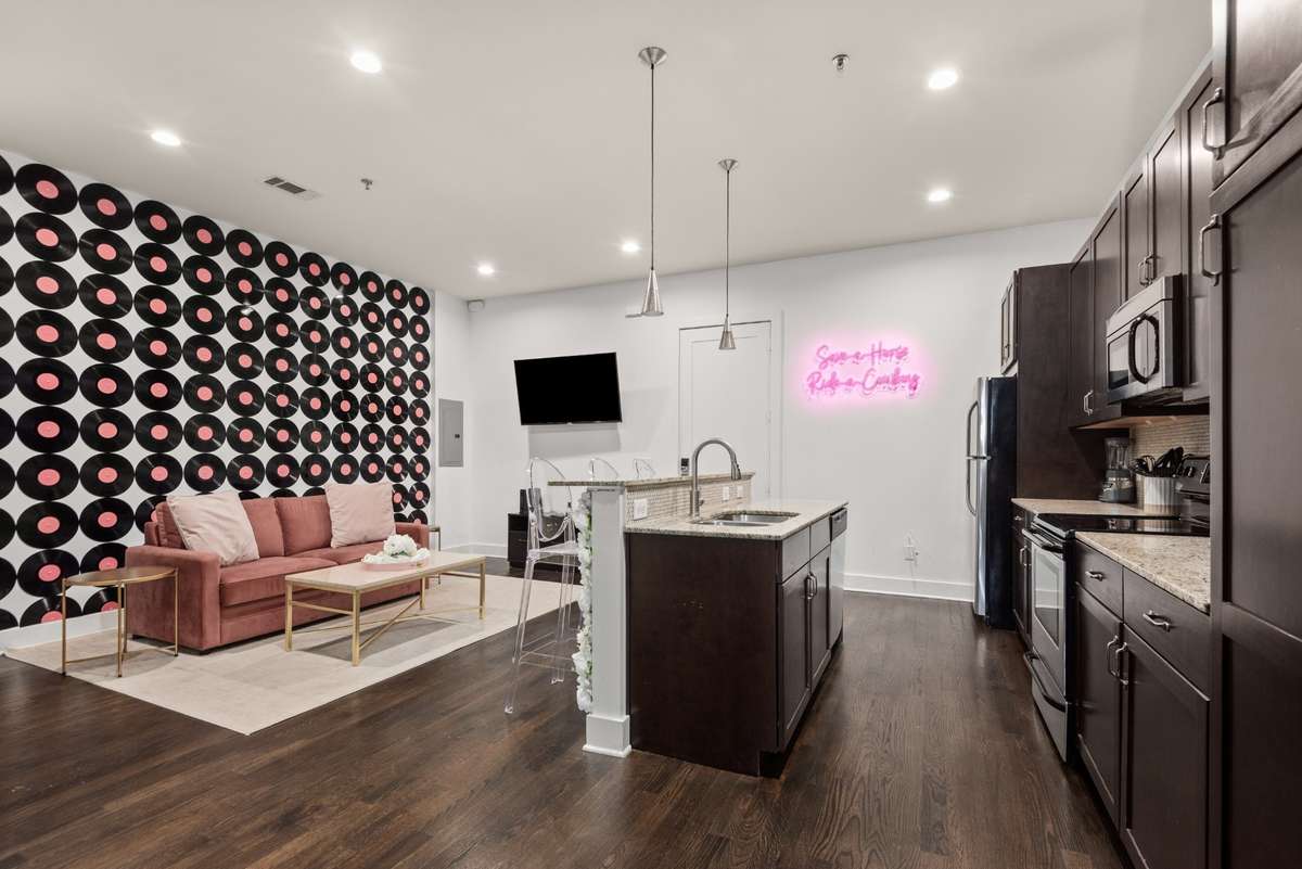 Kick back! Relax or entertain in this spacious and private world of "The Dollhouse!