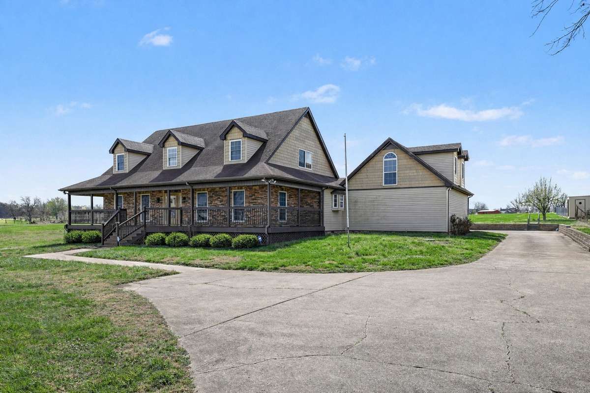 A Welcoming Drive Leads You Home To Peaceful Country Living