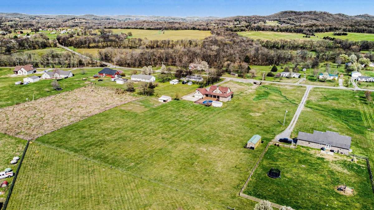 A Breathtaking Aerial View Showcasing The Home, Expansive Acreage, And Peaceful Country Setting
