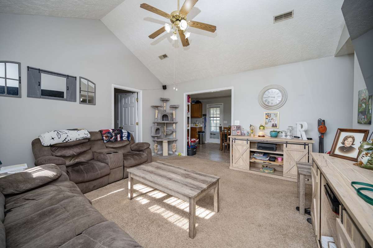 Living room with a Cathedral Ceiling!!