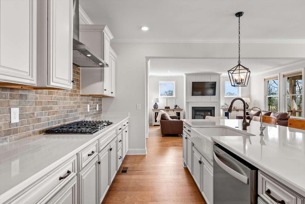 Thoughtfully designed kitchen with generous counter space and a clear line of sight to the living area—blending function and flow