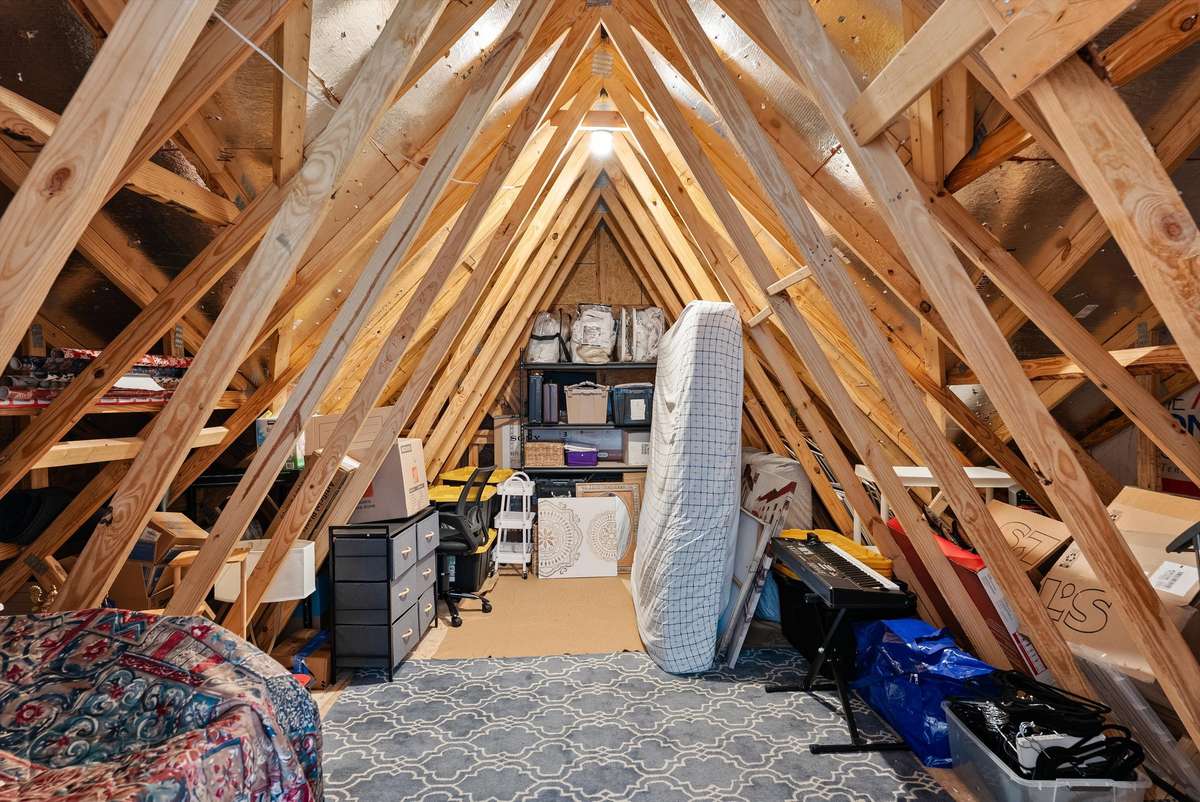 Unfinished attic space not included in the square footage—ideal for storage, seasonal items, and keeping everything neatly tucked away.