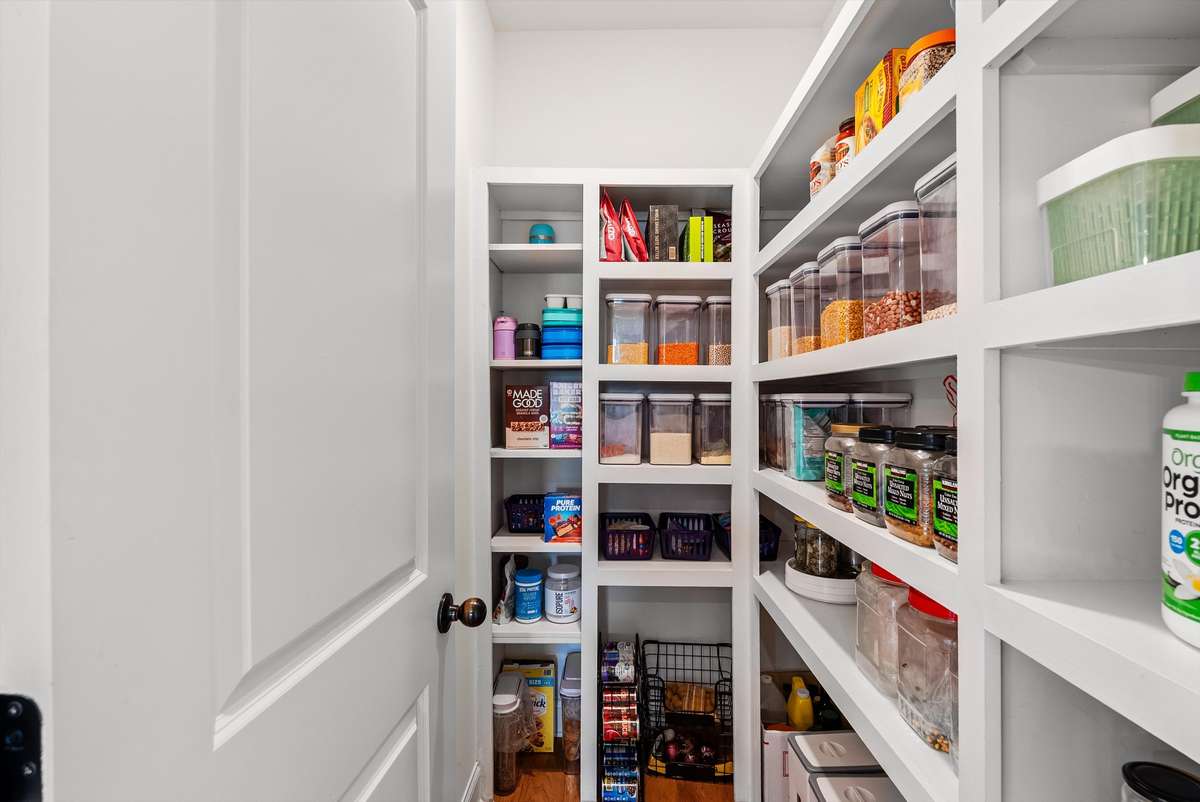 All the closets in the home have been upgraded to custom wooden shelving - no wire in sight!