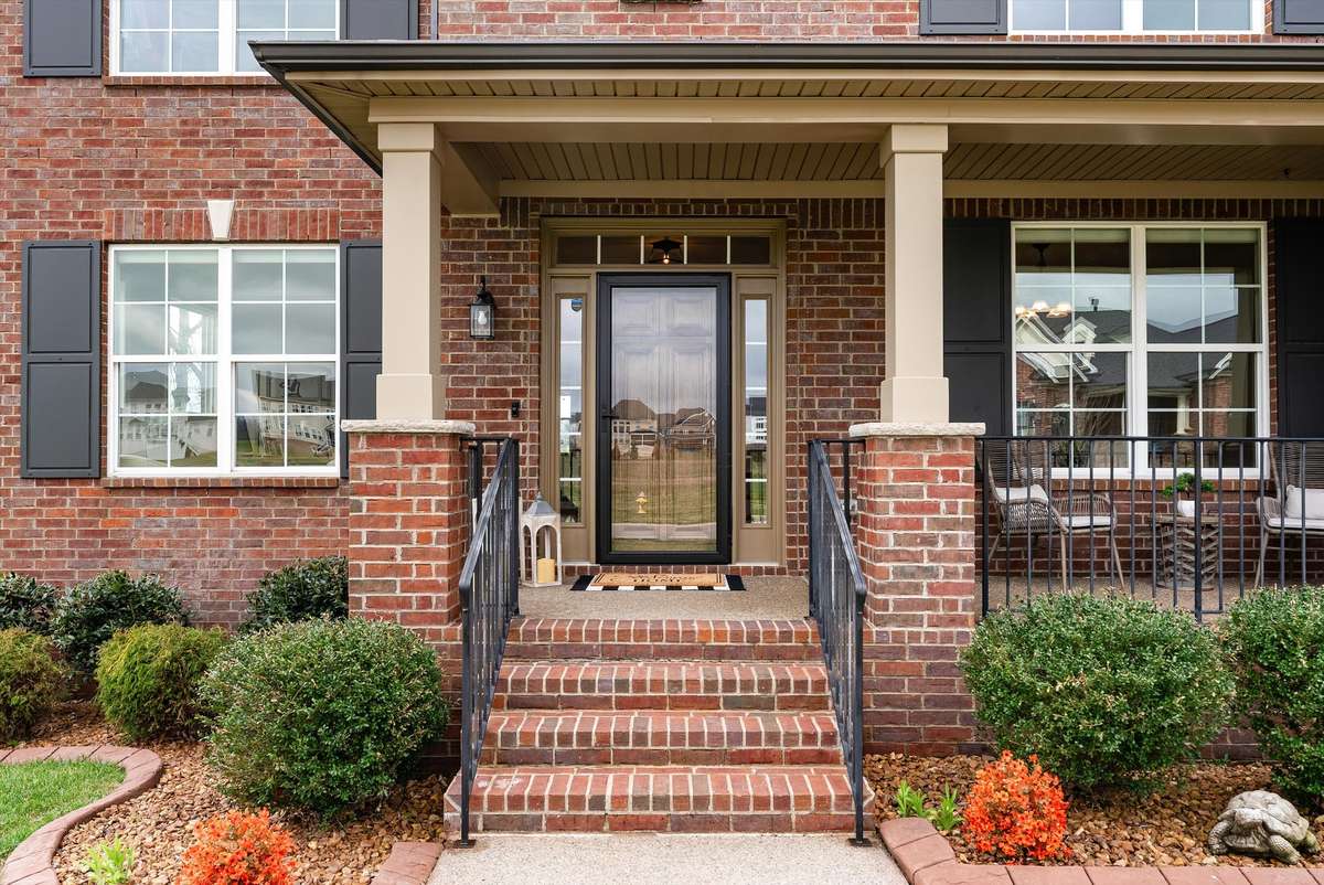 Covered front porch to welcome friends and family