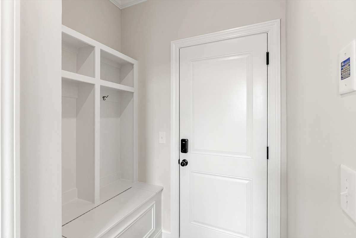 Functional drop zone with built-in cubbies and bench seating—perfect for keeping everyday essentials organized and out of sight.