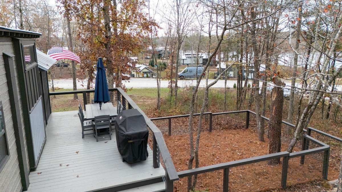 Picture yourself eating dinner on the deck with a lake view while your fur friends are safely enjoying some outdoor time!