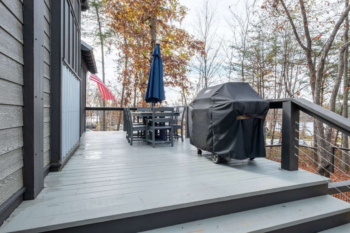 Alfresco dining on the deck with picturesque views of the lake