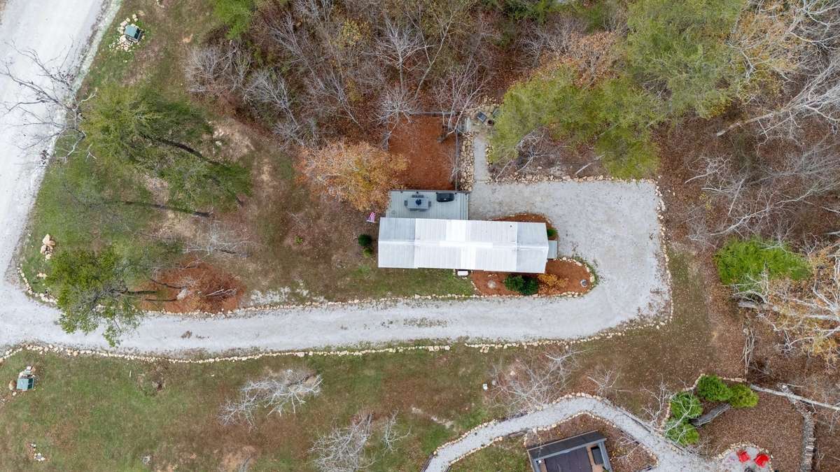 Ample parking space in the gravel driveway