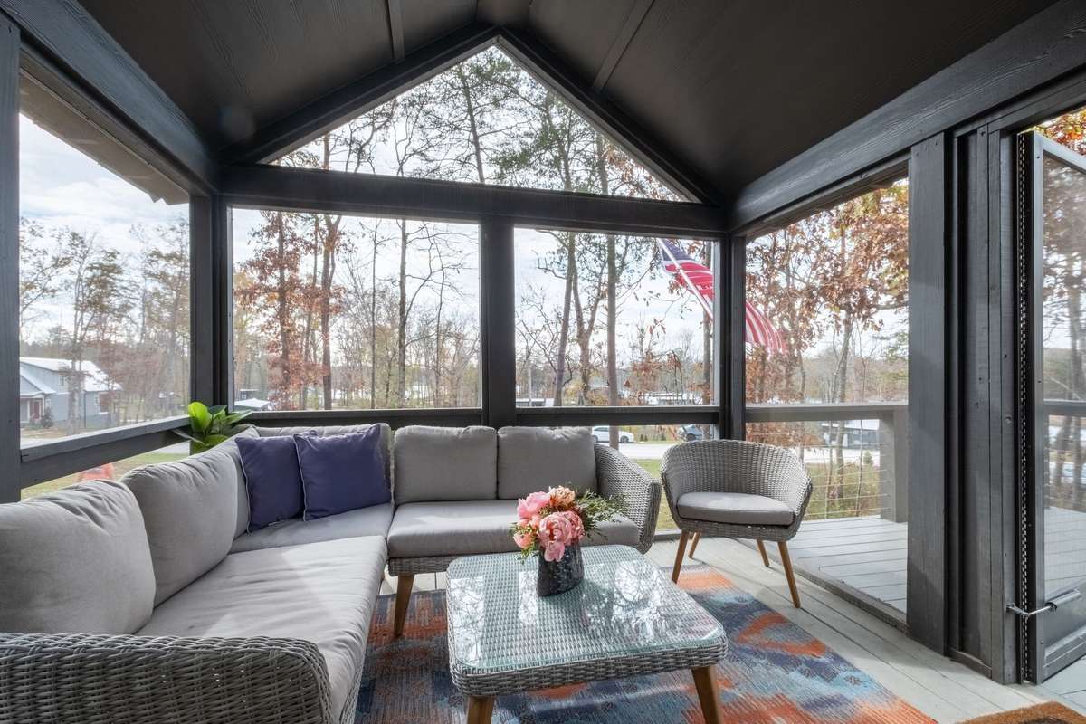 A lovely screened-in porch connects your outdoor deck to the home guaranteeing year-round enjoyment of the outdoors!