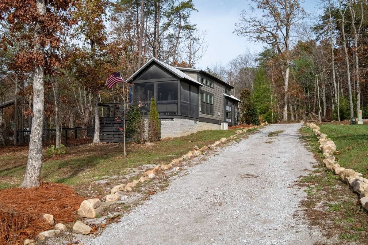 Your private retreat home sits on a hill across from the 95 acre lake that is the center point of the community