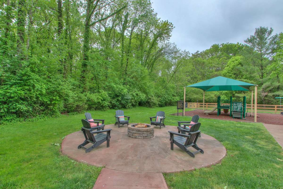 Fire area and playground with plenty of green space