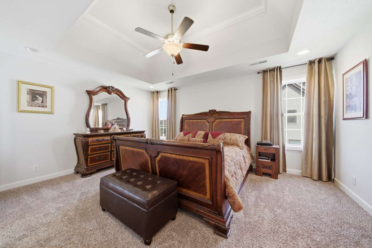 Open Master Bedroom with tray ceiling.