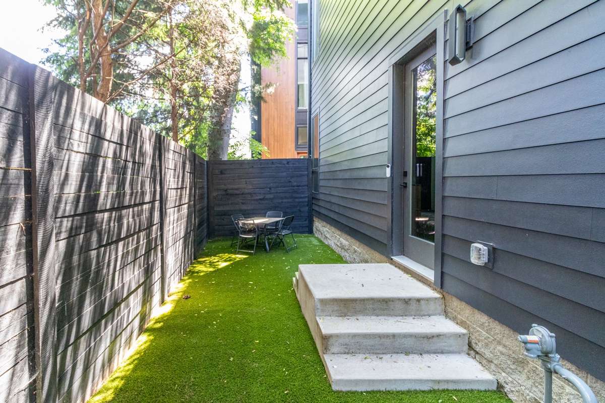 Side turfed yard. Easy care.