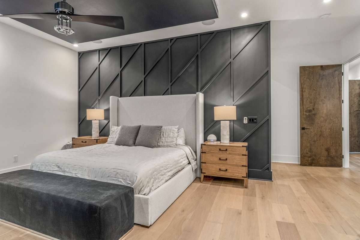 More elevated design with a feature wall in the master.