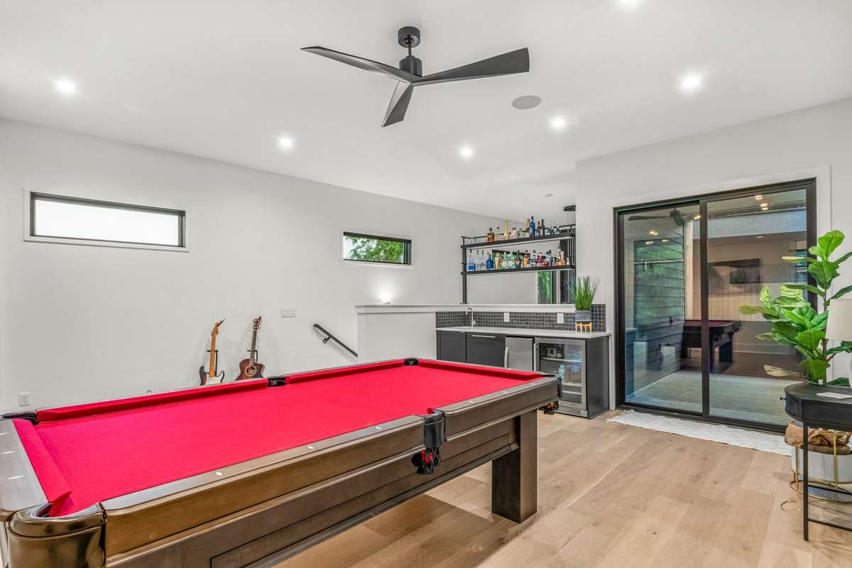 Easy access from bonus room out to the large covered terrace for seamless entertaining.