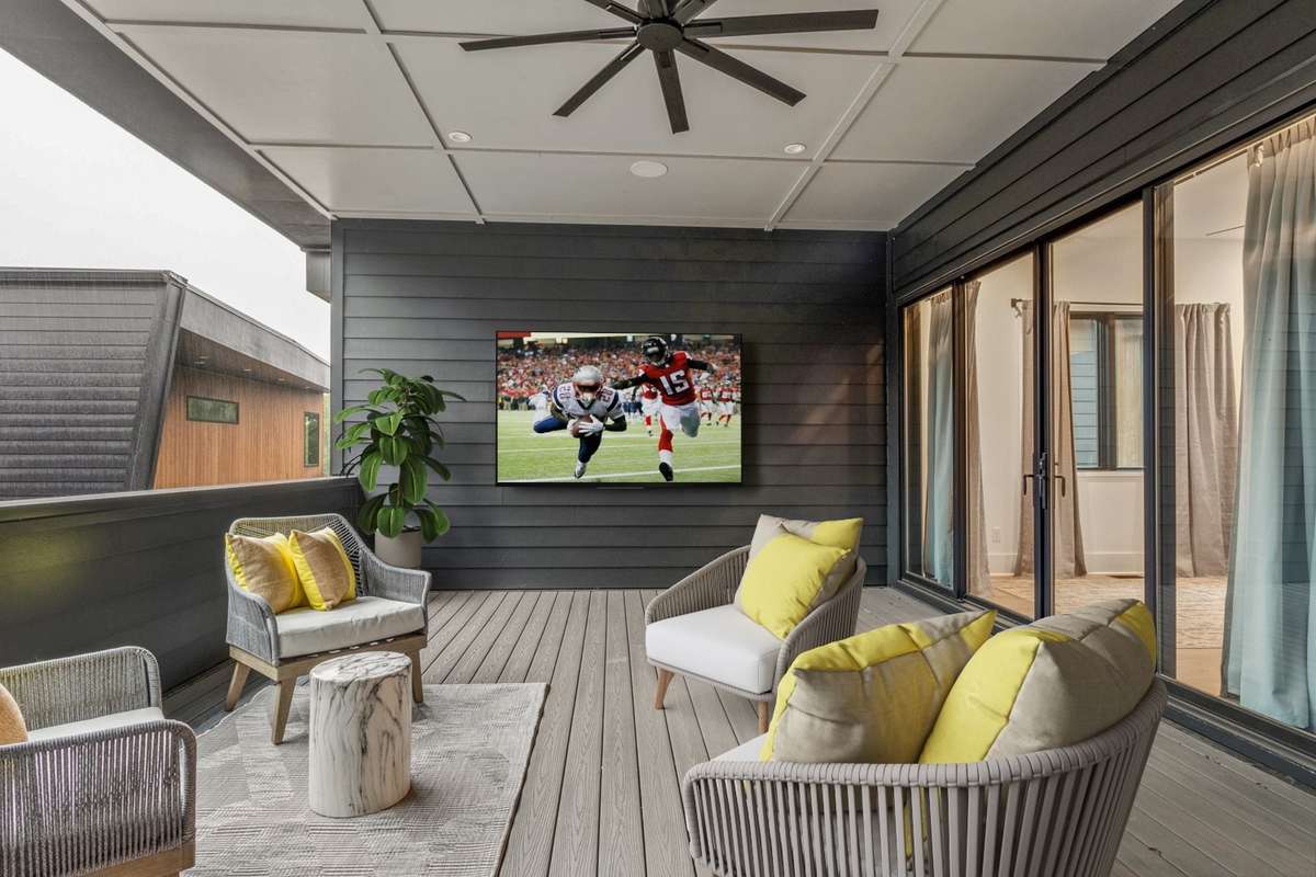 Covered top level outdoor terrace. Gas line has been run and ready for your grill or outdoor kitchen set up.***virtual staging shown above**