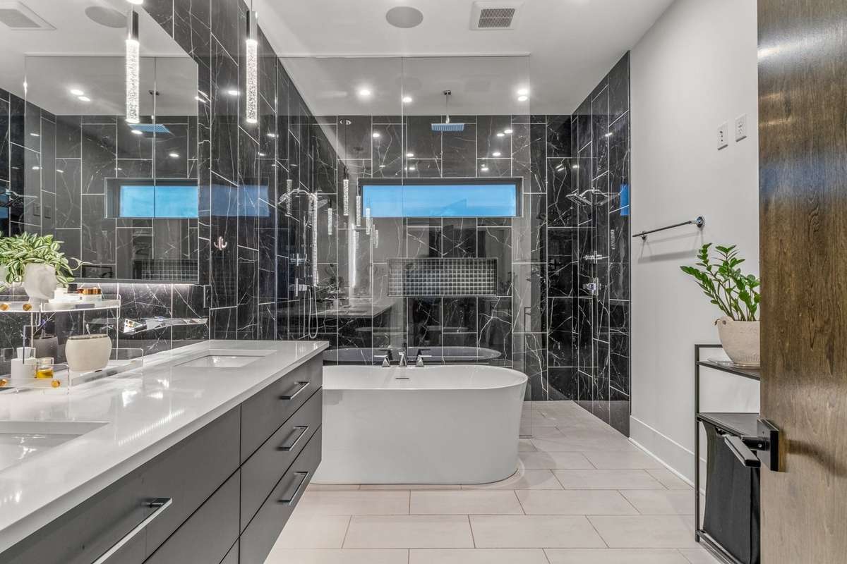 Soaking tub, massive no entry, walk-in shower, and dual vanities
