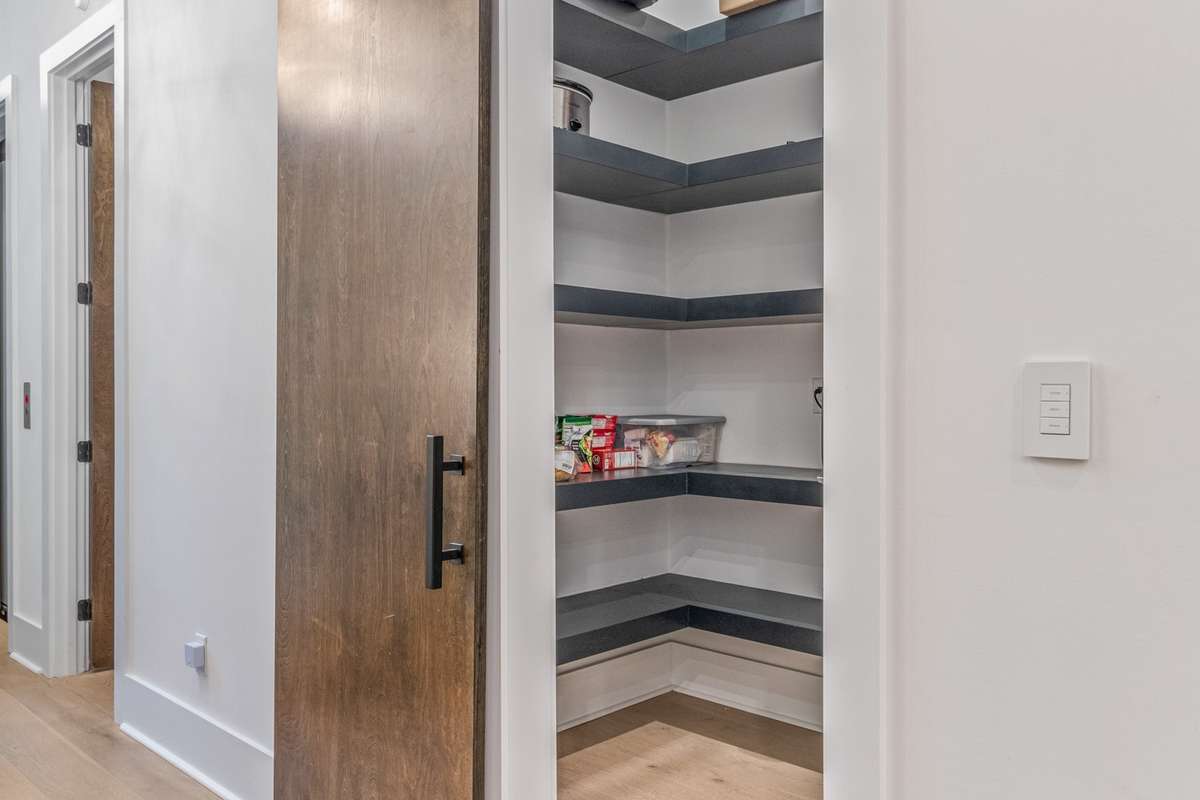 Massive walk-in pantry convenient to kitchen