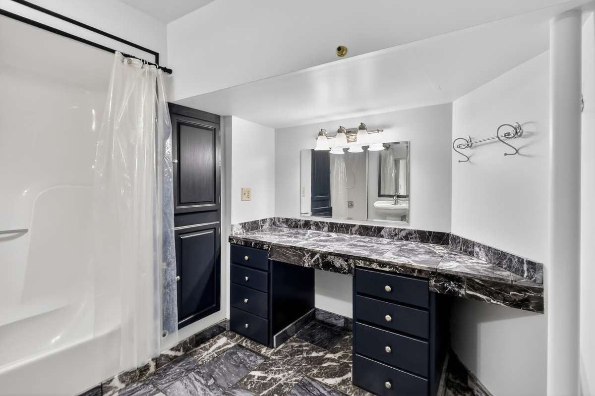 basement level bath has great cabinet and counter space!