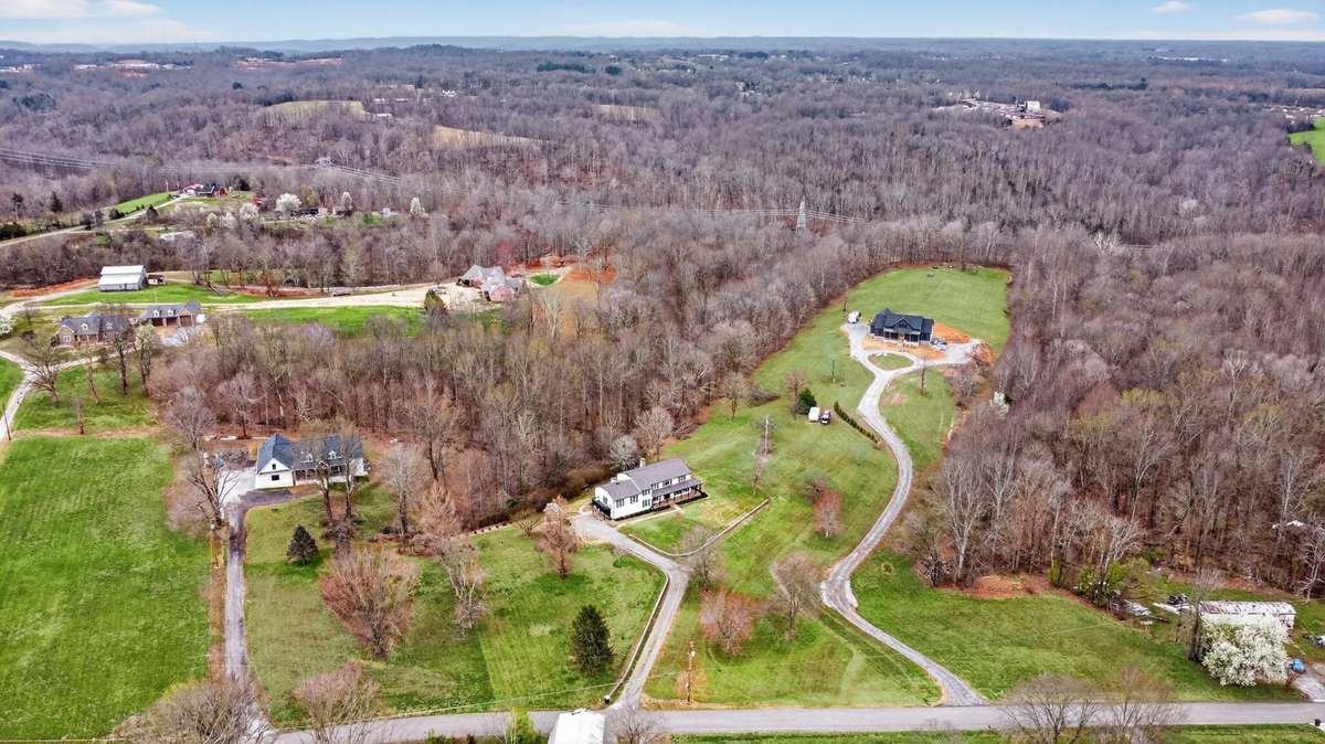 Beautiful homes and land all around! Such a great setting!