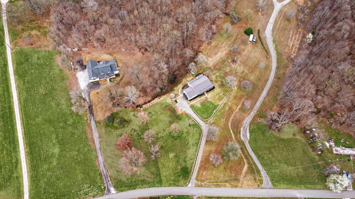 Woods at the back of the home creates complete privacy out back!