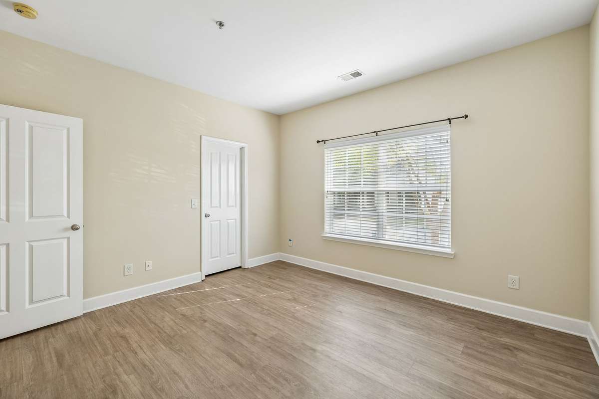 Secondary bedroom with walk-in closet