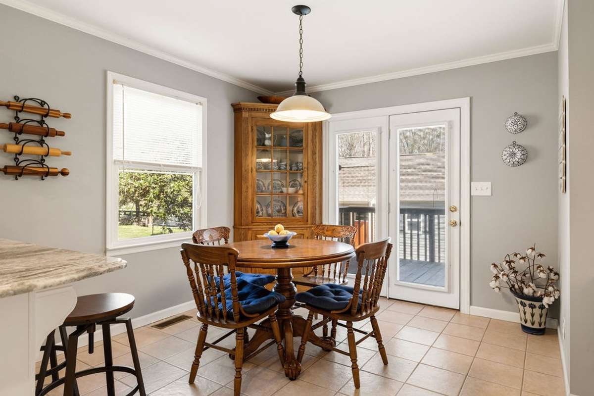 Large eat-in area in kitchen. Large windows allow plenty of sunlight.
