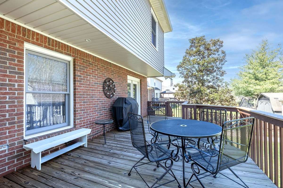 Enjoy morning coffee on this large, spacious deck.