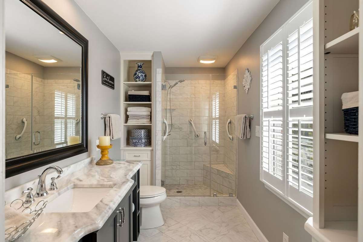 Large vanity and walk-in shower.