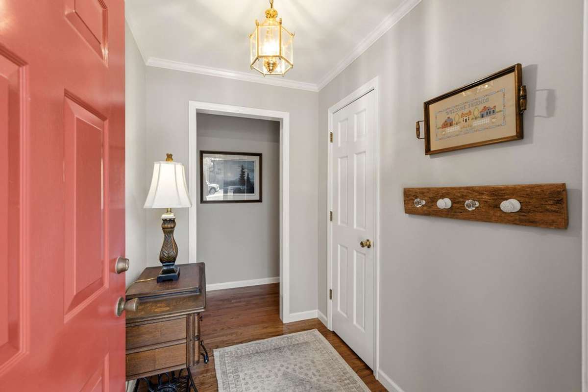 Foyer with extra nice hardwood floor.