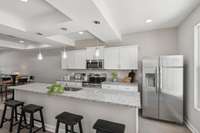 Photo is of different unit, identical interior.