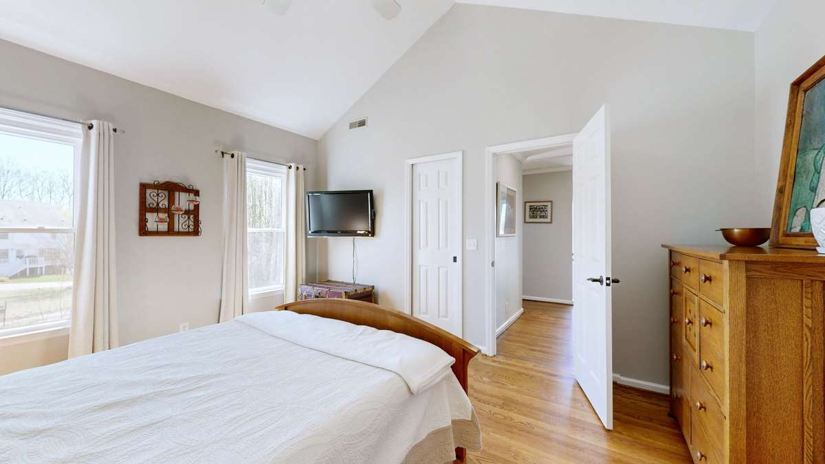 The door to the left of the entrance leads to a walk in closet. One of two closets in this primary suite!