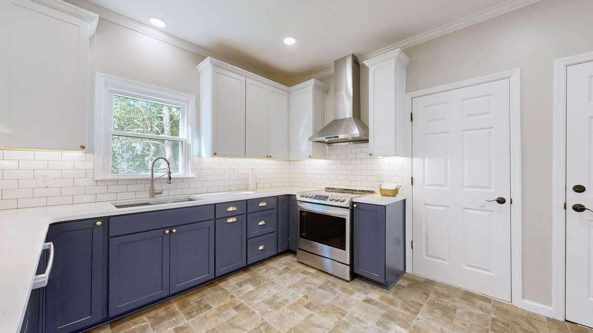 Range hood is vented to the outside.