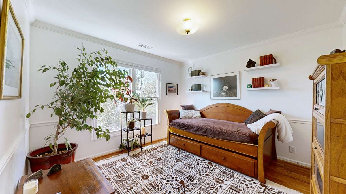 One of two guest bedrooms upstairs.