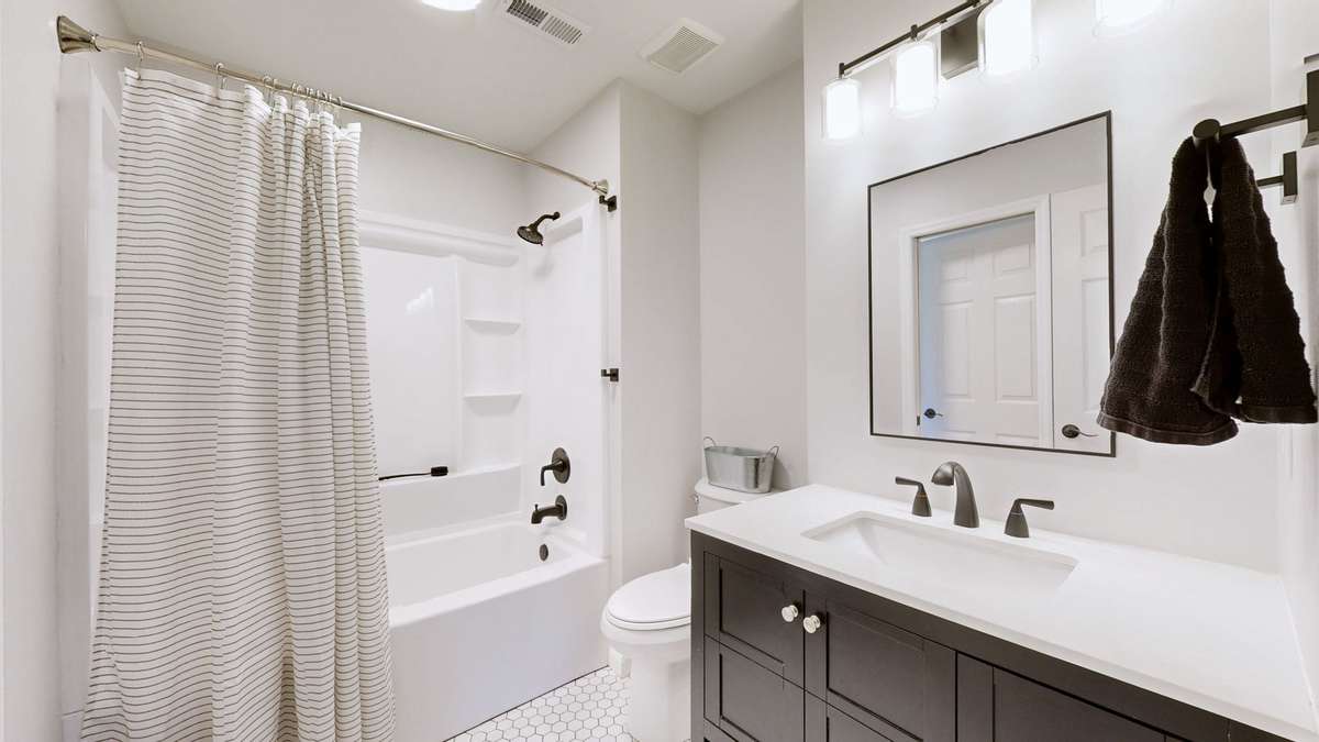 Fully renovated hall bath is gorgeous and timeless!