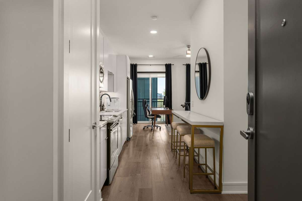 Proper entry with space for dining bar