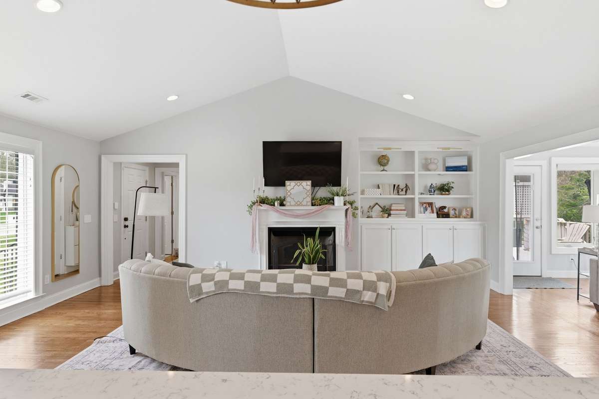 Another view of the Living Room with its built-ins and gas fireplace!