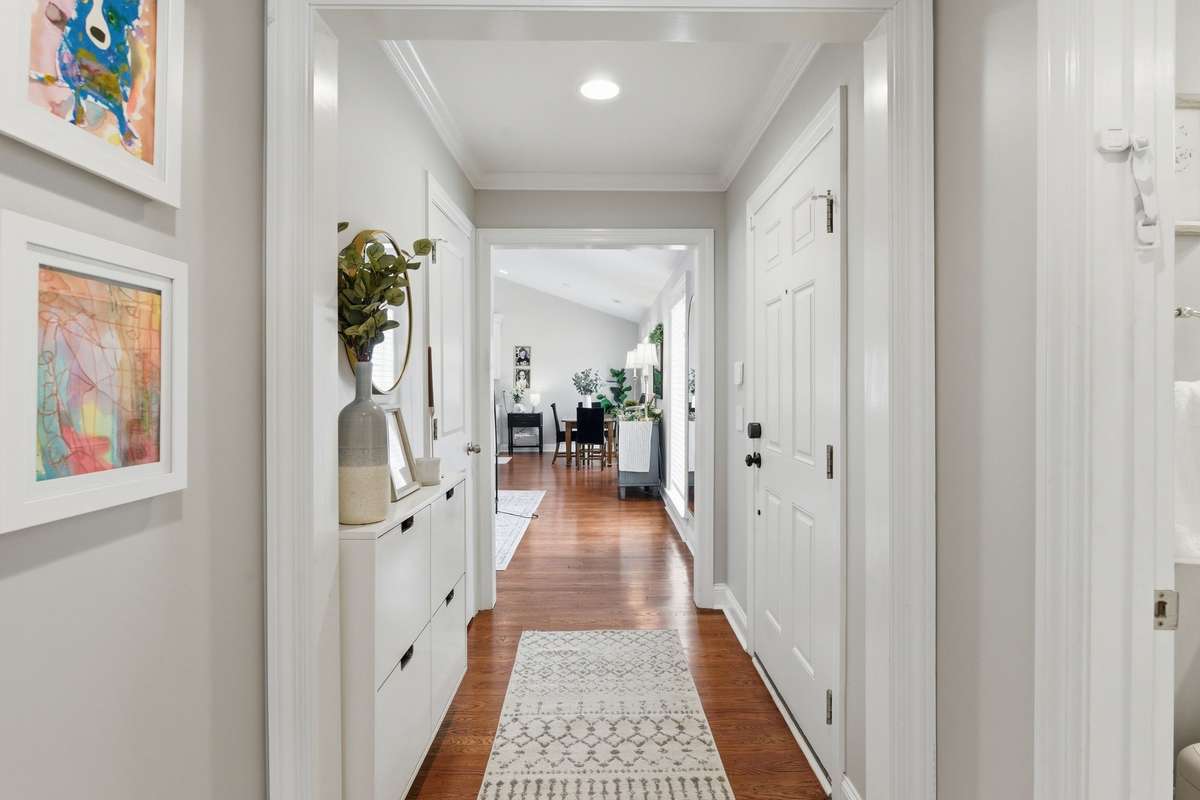 Smart lights were installed throughout the property and, when you enter the entry foyer, one push of a button allows you to have your tailored lighting pop on!