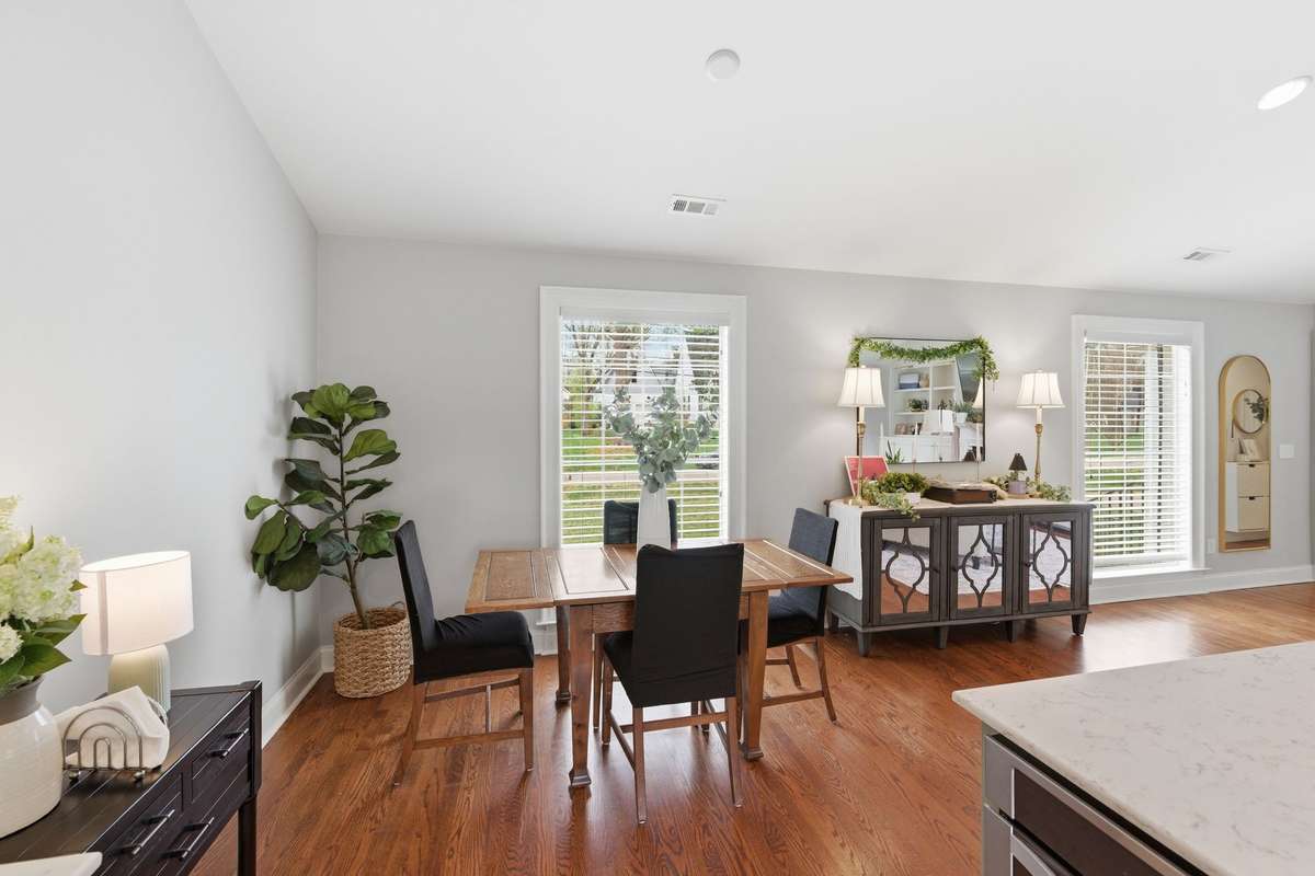 The combination dining area offers space for formal or informal dining.  It can also be used as flex space if buyers don't have a need for a formal dining room.