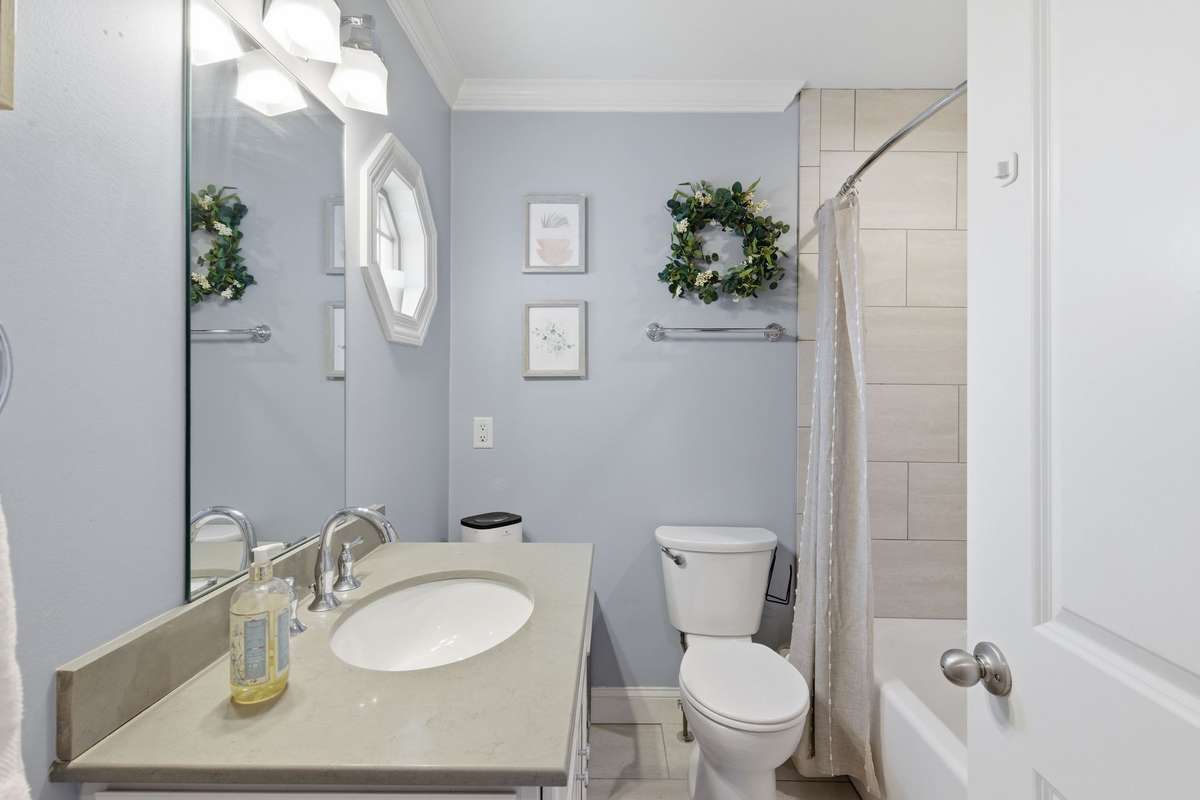 The second bathroom serves Bedroom 2 and also serves as the Guest Bathroom