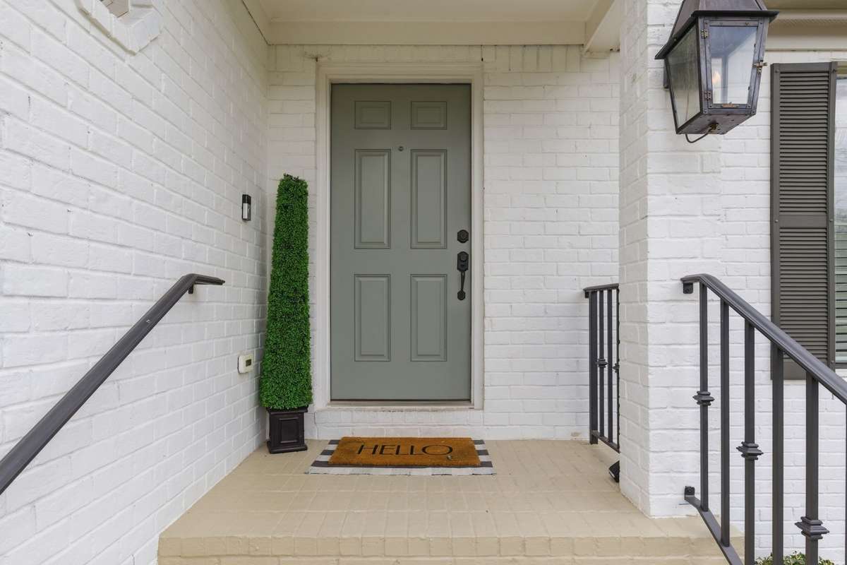 From the moment you step foot onto the front porch, everything about this house welcomes you "Home."