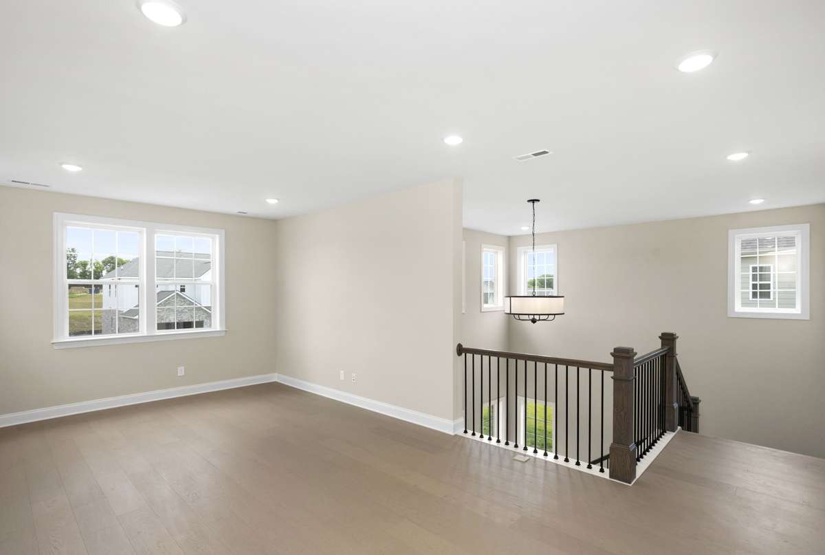 Another view of the 2nd floor den with staircase view