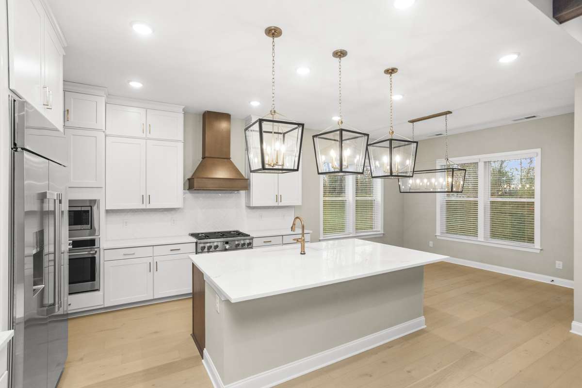 Another view of the kitchen and dining area