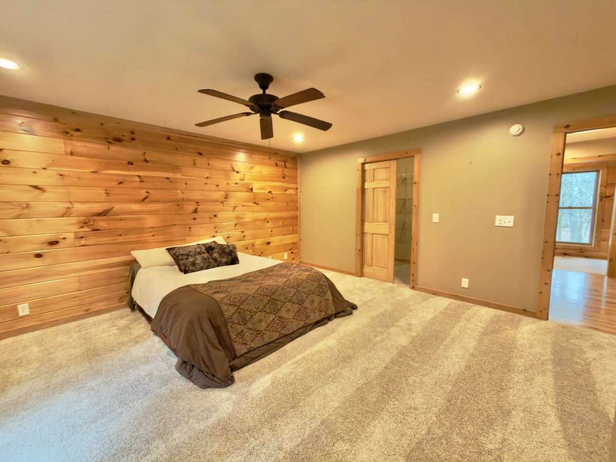 Sliding pocket doors on walk-in closet and bath.
